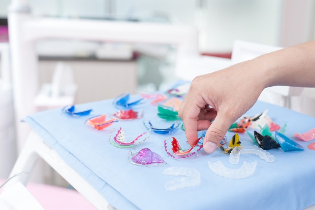 Assortment of retainers on display at dental office